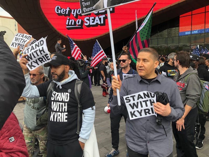 Anti-vaccine protesters outside of the Barclays Center to support Kyrie Irving during the Brooklyn Nets home opener on Sunday, Oct. 24, 2021.