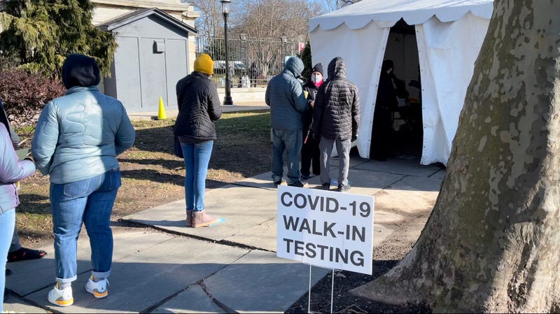 People waiting in line to get a COVID-19 test.