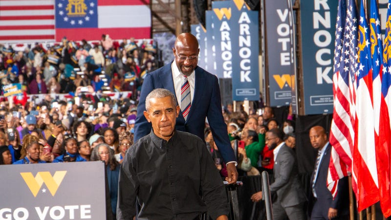 Former President Barack Obama and Senator Raphael Warnock together
