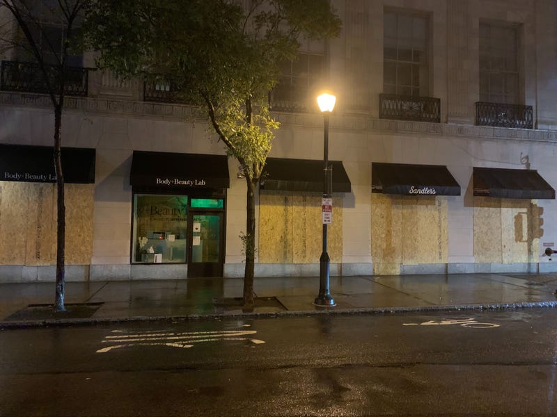 Philadelphia police are stationed at intersections throughout Center City, and many businesses are closed or boarded up on Friday.