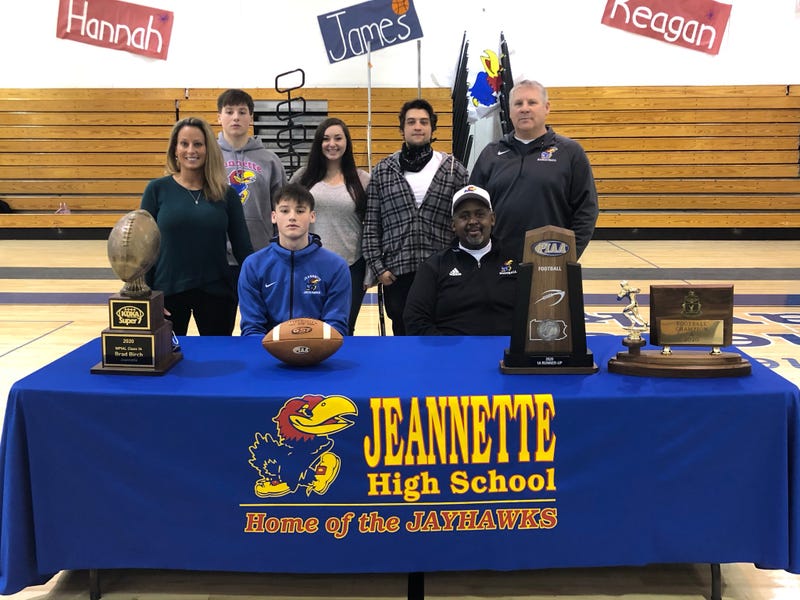 Jeannette Jayhawks quarterback Brad Birch with KDKA Radio Super 7 trophy