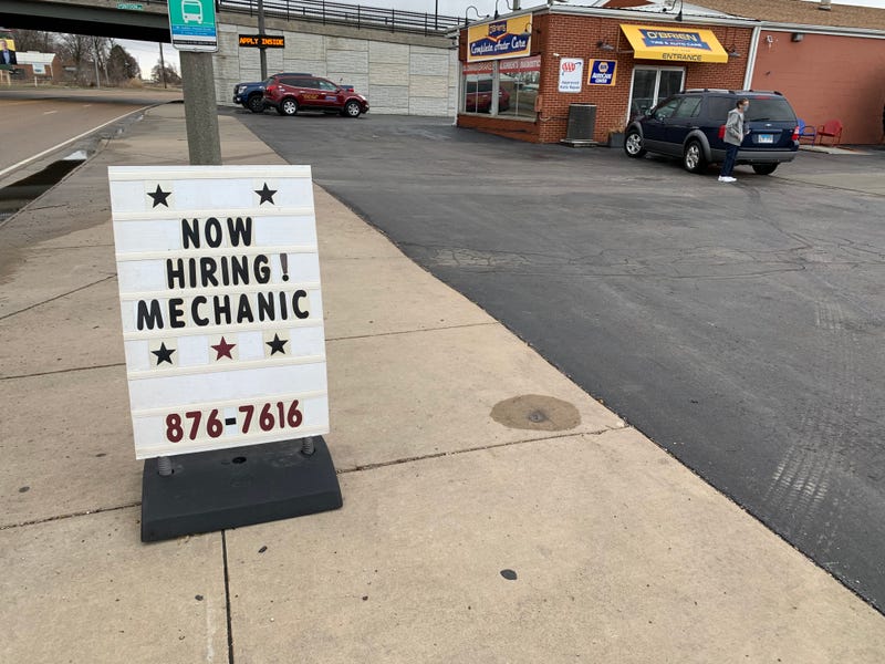 Help wanted signs out at auto repair shops