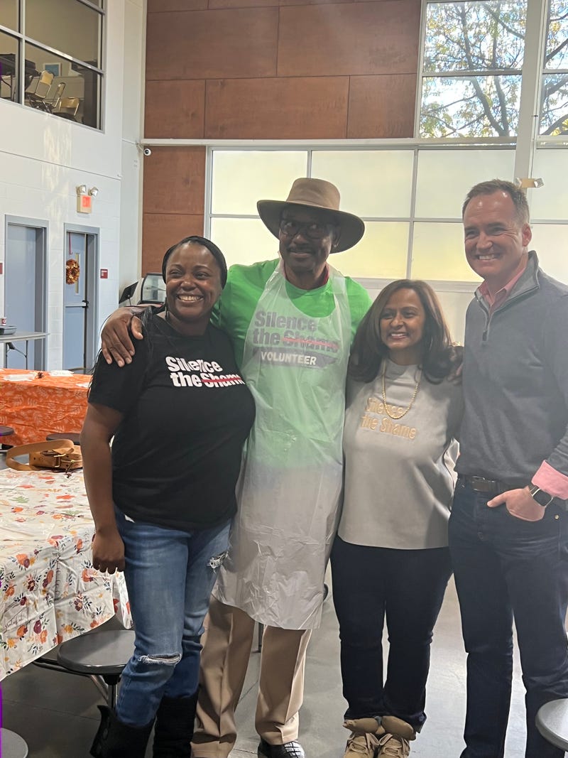 Founder of Silence the Shame, Shanti Das and CEO of the Atlanta Mission, Tensley Almand, with volunteers.