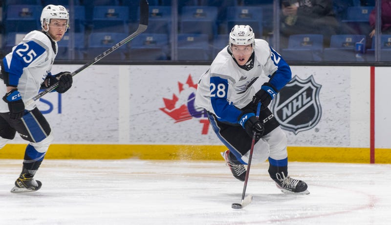 William Dufour handles the puck