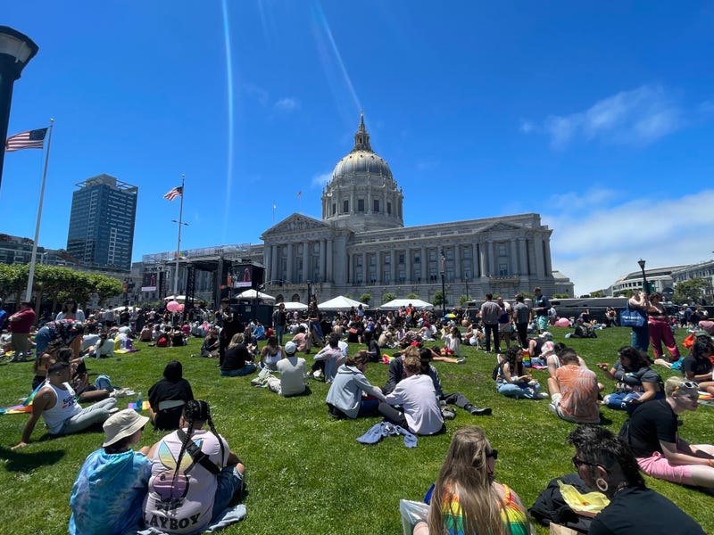 Many enjoying San Francisco Pride at city hall.