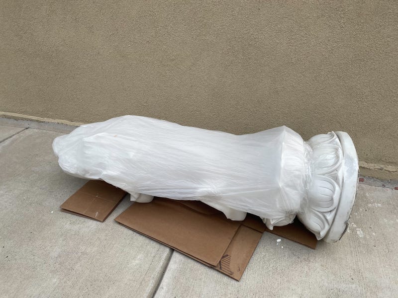 Broken Kuan Yin statue