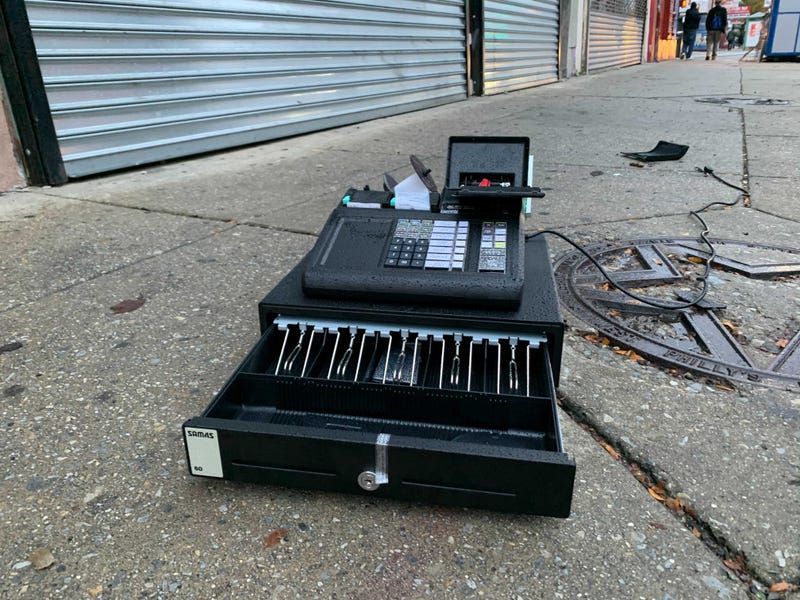 Looters pulled this cash register out of a store in West Philly during a period of unrest overnight.
