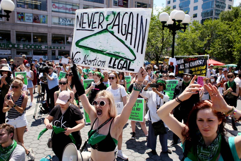 Activists shout slogans during a protest against the Supreme Court's decision in the Dobbs v Jackson Women's Health case on June 25, 2022 in New York City. The Court's decision in the Dobbs v Jackson Women's Health case overturns the landmark 50-year-old Roe v Wade case, removing a federal right to an abortion.