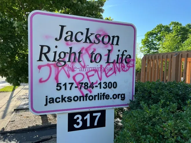 "Jane's Revenge" spray painted on sign