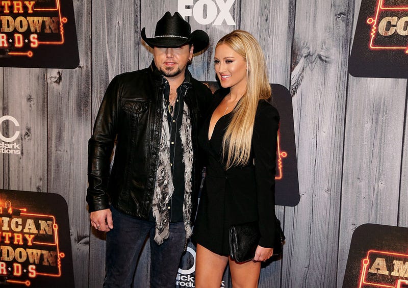 Recording artist Jason Aldean (L) and Brittany Kerr attend the 2014 American Country Countdown Awards at Music City Center on December 15, 2014 in Nashville, Tennessee