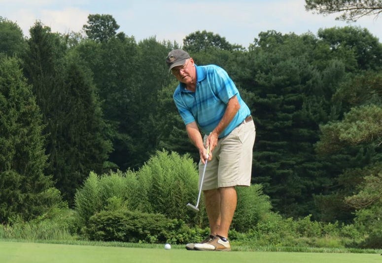 Jim Colony golfing