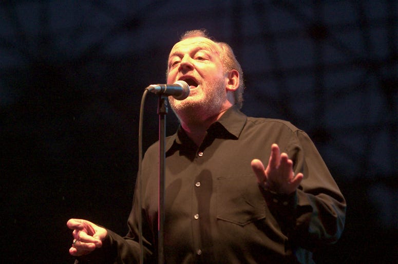 Joe Cocker performs May 3, 2003 during the Music Midtown concert in Atlanta, Georgia