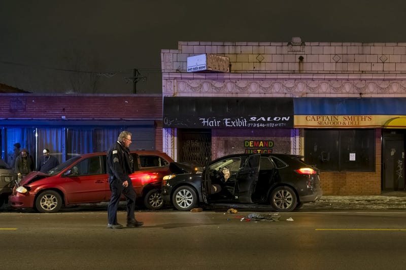 Chicago police work the scene where two people were shot including a 3-year-old during an attempted carjacking in the 7900 block of S. King Dr. in the Chatham neighborhood, Thursday, Jan. 13, 2022.
