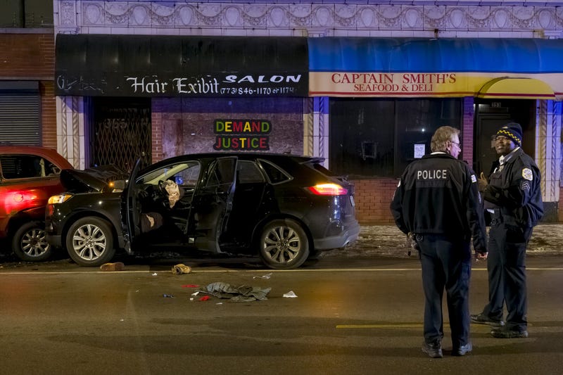 Chicago police work the scene where two people were shot including a 3-year-old during an attempted carjacking in the 7900 block of S. King Dr. in the Chatham neighborhood, Thursday, Jan. 13, 2022.