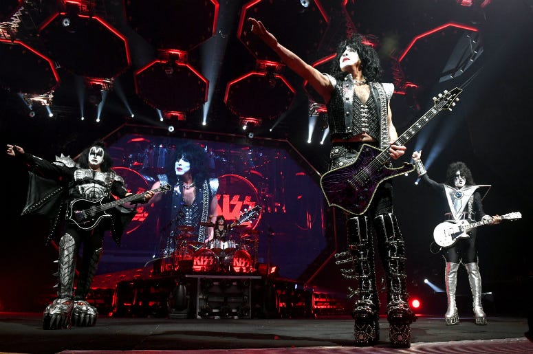 Gene Simmons, Paul Stanley and Tommy Thayer of KISS perform during their End Of The Road World Tour at The Forum