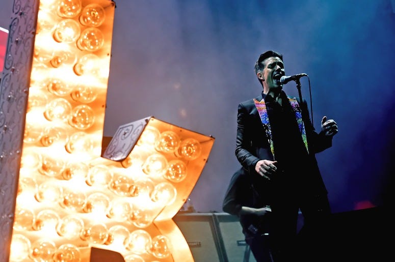 Brandon Flowers of The Killers performs onstage during the grand opening of T-Mobile Arena