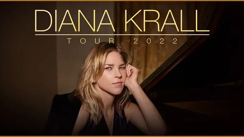Diana Krall leaning on a piano