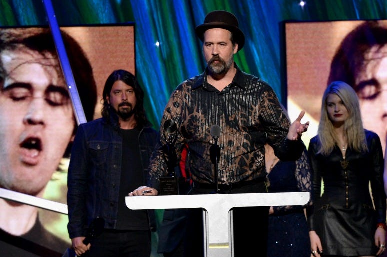 Krist Novoselic of Nirvana speaks onstage at the 29th Annual Rock And Roll Hall Of Fame Induction Ceremony