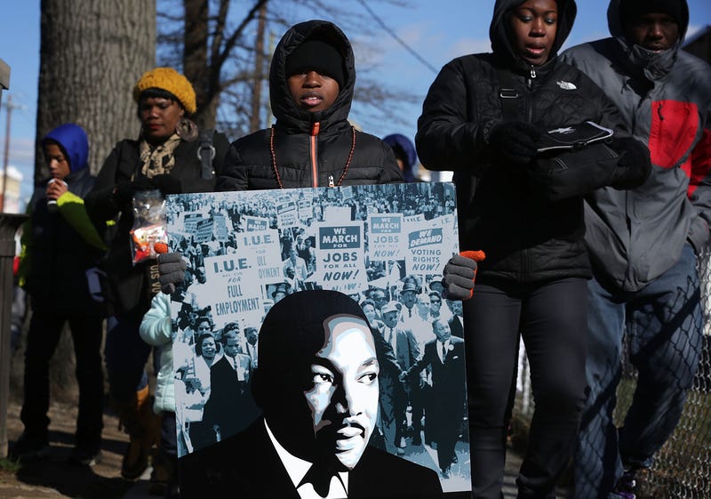 A boy walks in D.C.'s annual Martin Luther King Holiday Peace Walk and Parade