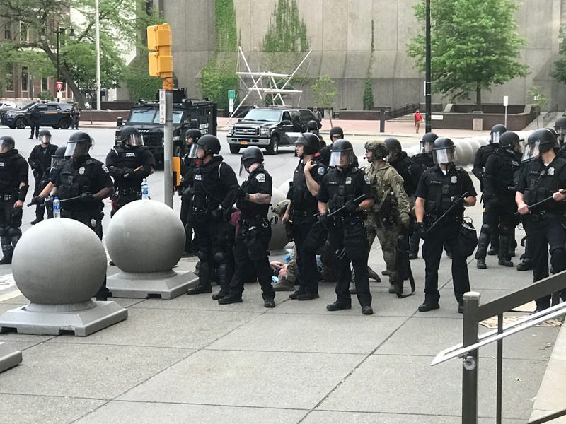An elderly man is pushed by Buffalo Police when clearing Niagara Square. June 4, 2020