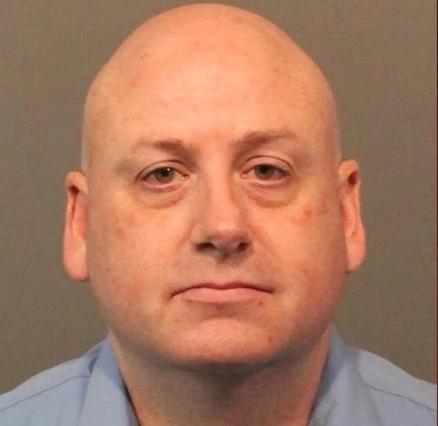 Booking photo of Matthew Carter