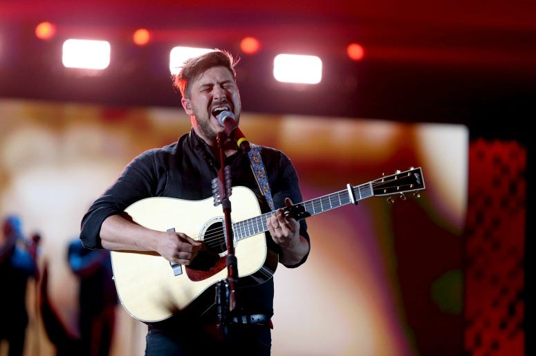 Marcus Mumford of Mumford & Sons performs onstage