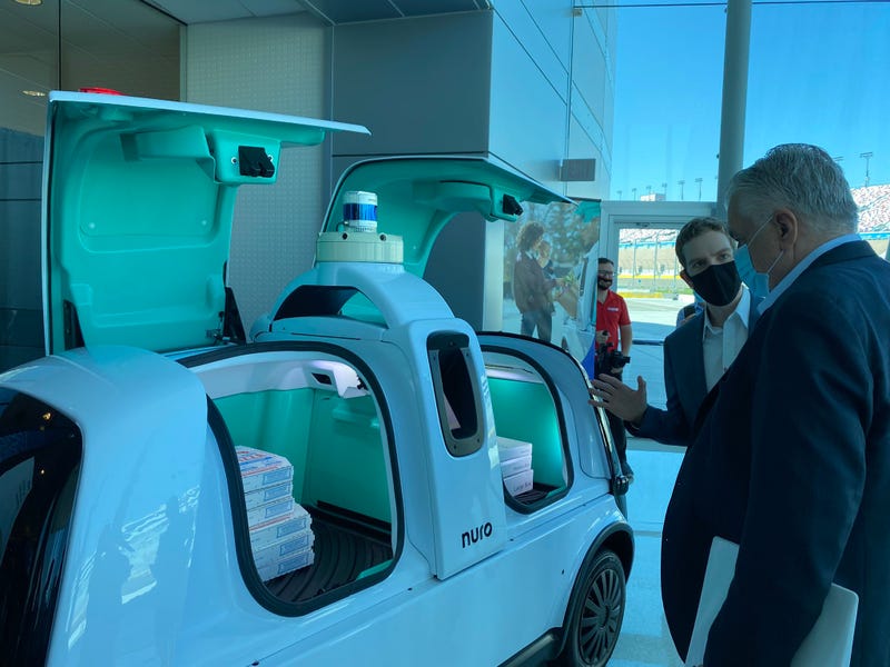 Nevada Gov. Steve Sisolak gets briefed on a new autonomous vehicle plant