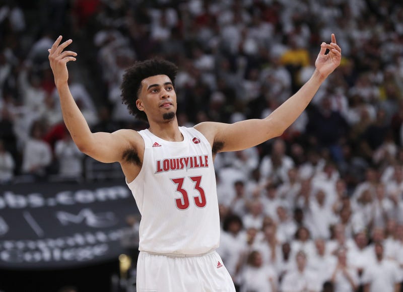 Louisville F Jordan Nwora (33) pumped up the crowd during the last seconds of their 58-43 win against No. 4 Michigan in Louisville, Ky. on Dec. 3, 2019. It was their first game after receiving the number 1 ranking. Uofl Mich06 Sam