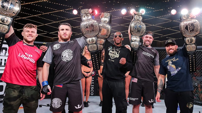 Professional Fighters League champions pose with their belts at PFL 11 at Madison Square Garden.