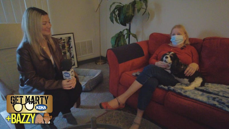 Arianna Bazzy talks to Carol inside the apartment she's in danger of losing.