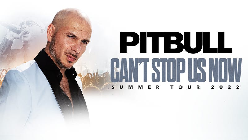 Pitbull in white suit in front of crowd with tour text