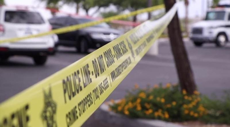 Yellow tape ropes off a crime scene