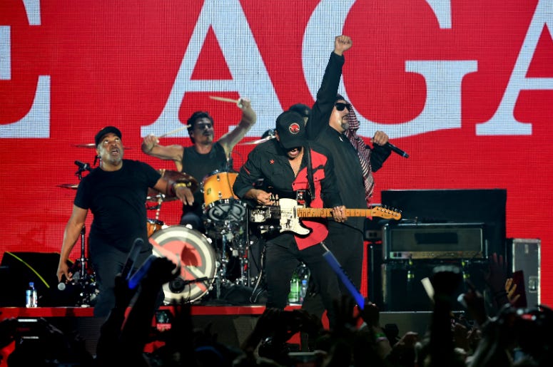Tim Commerford, Chuck D, B-Real, Brad Wilk, B-Real and Tom Morello of Prophets of Rage perform