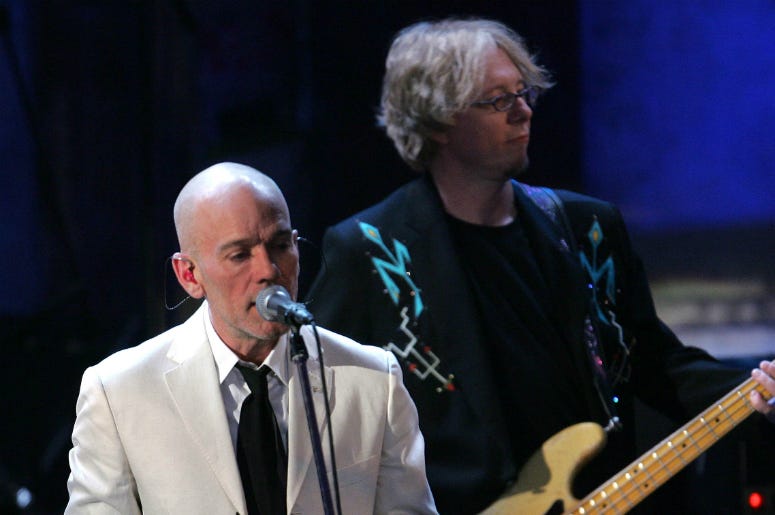 Michael Stipe and Mike Mills of R.E.M. perform at the 22nd annual Rock And Roll Hall Of Fame Induction Ceremony