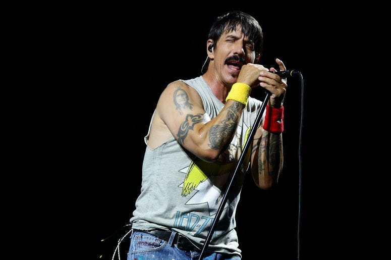 Anthony Kiedis of the Red Hot Chilli Peppers performs on stage during day three of Formula 1 Singapore Grand Prix