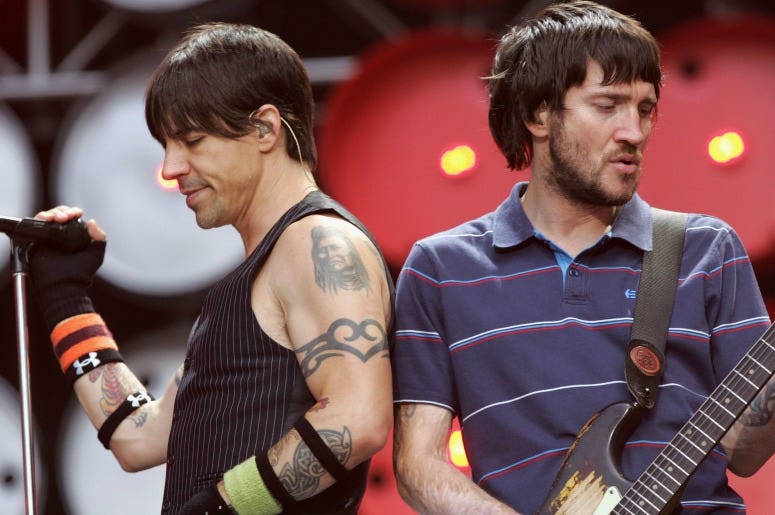 Anthony Kiedis and John Frusciante of the Red Hot Chilli Peppers performs on stage during the Live Earth concert at Wembley Stadium on July 7, 2007