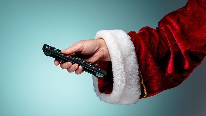 Santa holding a remote control
