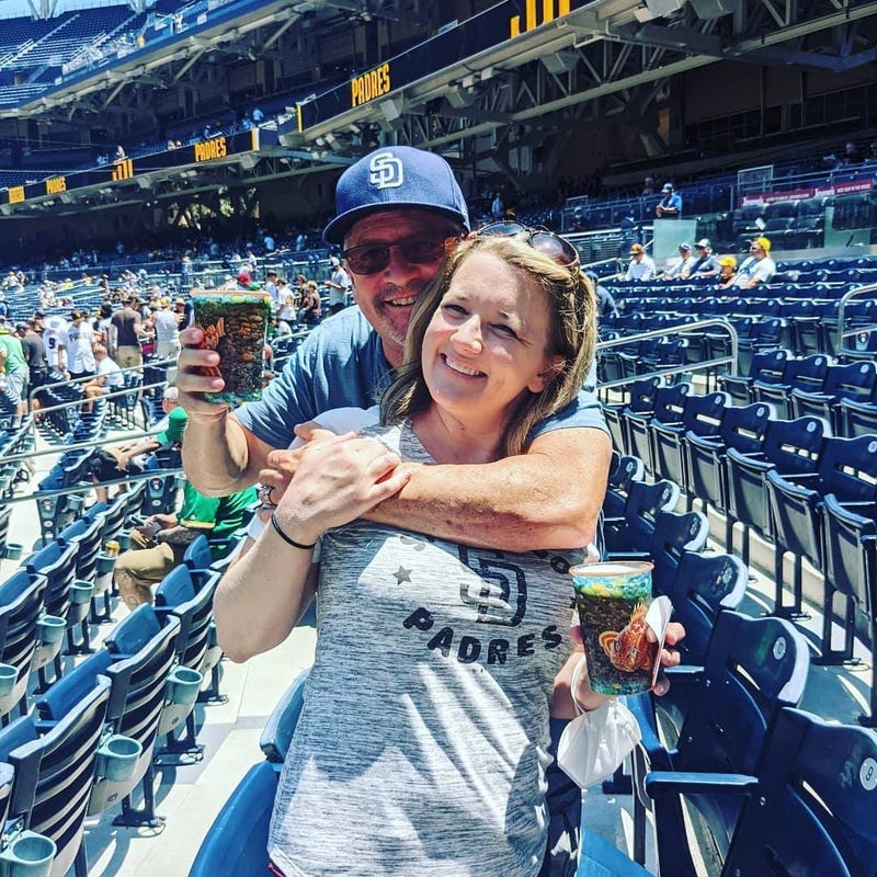 Rob and Joss with Padres Gear On