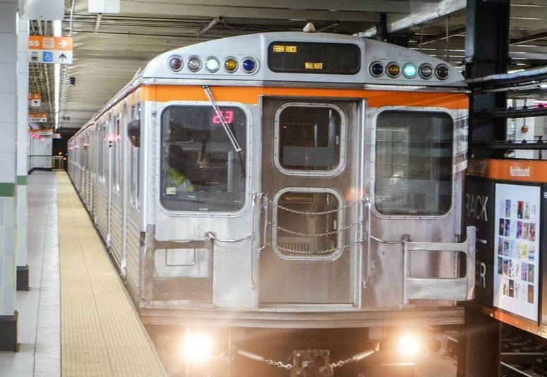 A SEPTA Broad Street Line subway train pulls into a station.