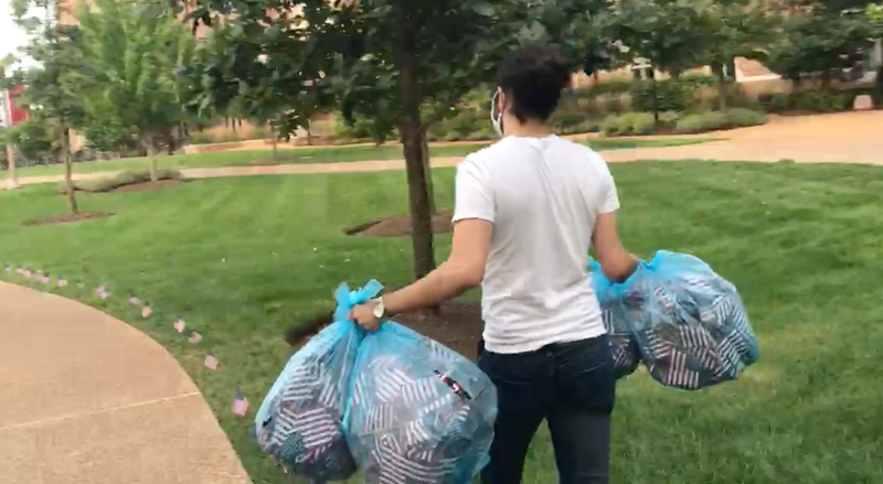 Student removes flags