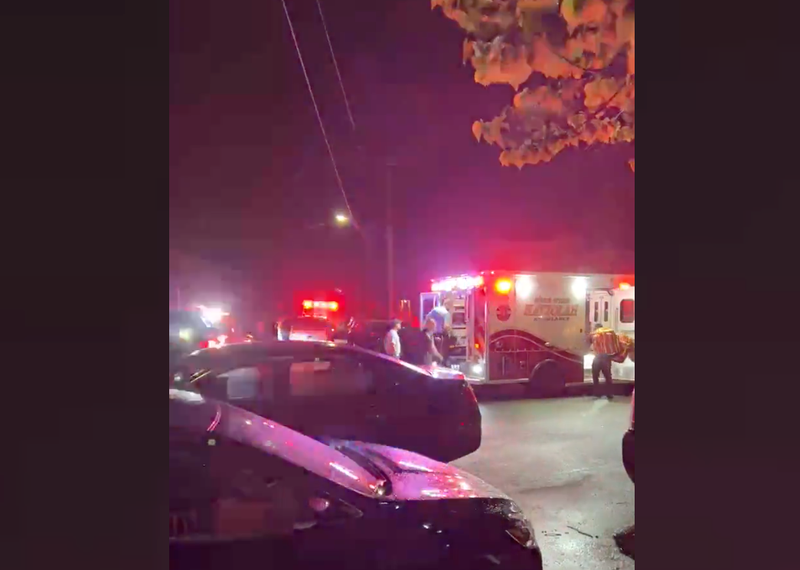 Police and paramedics were seen outside of a home in Bergen Beach after a man allegedly stabbed both of his parents Tuesday night