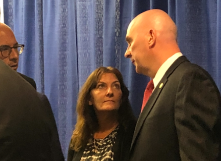 Darlene Altman, Diane Cusick's daughter, with Nassau County Police Capt. Stephen Fitzpatrick on Wednesday.