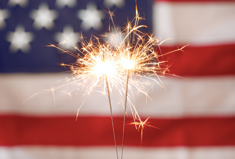Sparkler in front of American flag