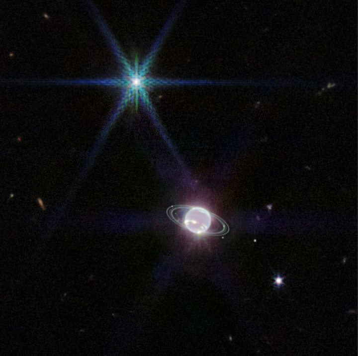This image of the Neptune system, captured by Webb’s Near-Infrared Camera (NIRCam), reveals stunning views of the planet’s rings, which have not been seen with this clarity in more than three decades. Webb’s new image of Neptune also captures details of the planet’s turbulent, windy atmosphere.