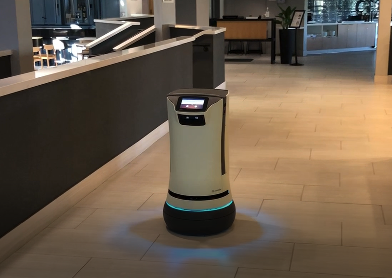 Wall-E glides down the hotel corridor.