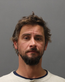 Charged with allegedly assaulting infant.
