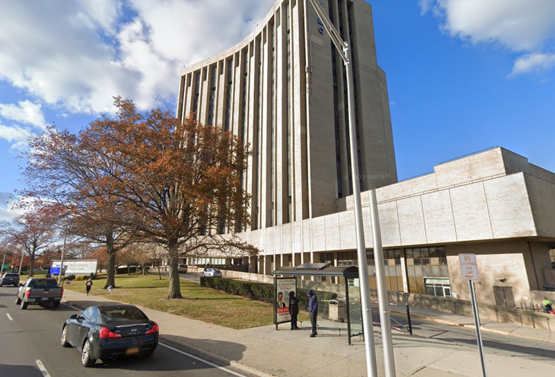 A young girl was harassed by a man while waiting at a bus stop with her mother near Nassau University Medical Center on Monday night, police said
