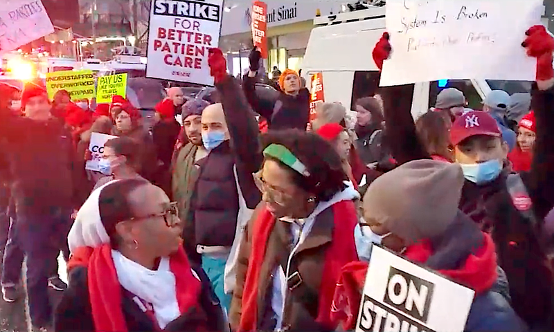 A crowd of striking nurses grew outside Mount Sinai Hospital in Manhattan on Monday morning
