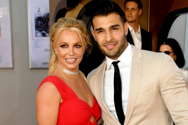 Britney Spears and Sam Asghari arrive at the premiere of Sony Pictures' "One Upon A Time...In Hollywood" at the Chinese Theatre