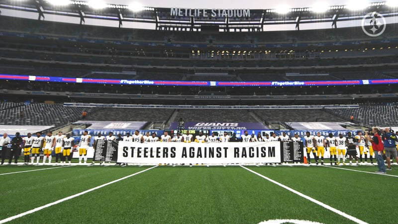 Pittsburgh Steelers stand for National Anthem holding Steelers Against Racism